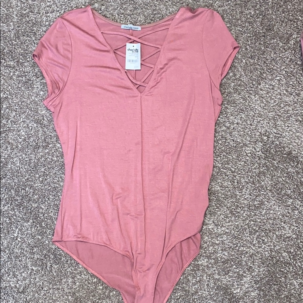 Pink body suit